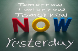 Now, yesterday, and tomorrow words on blackboard, Time concept.